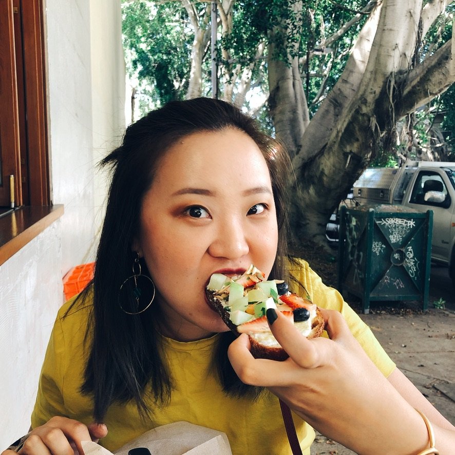 Tina enjoying local food while travelling